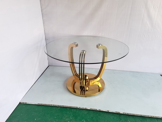 De minimalistische Gouden Eettafel van de Roestvrij staalbasis met Glasbovenkant