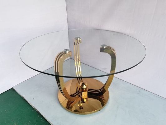 De minimalistische Gouden Eettafel van de Roestvrij staalbasis met Glasbovenkant