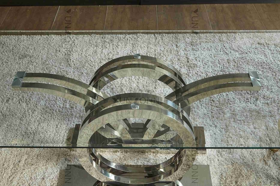 Van het de Luxe plaatste de Moderne Glas van het zeemeeuwenontwerp Hoogste Eettafel 4 Seater het Kaderzilver van de Roestvrij staalbasis